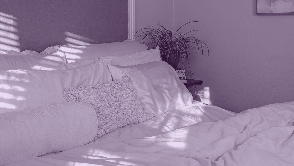 A bedroom dressed in linen