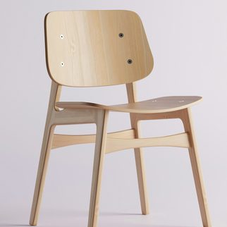 A light wood chair on a plain background