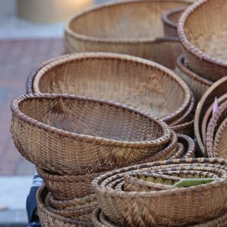A stack of woven wicker baskets
