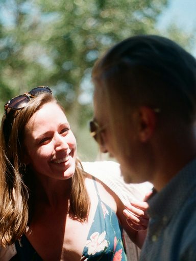 Guests laughing at the reception