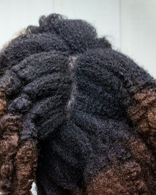 Textured hair in twists with soft brown ends
