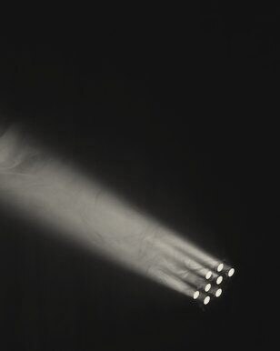 A single stage light cutting through haze