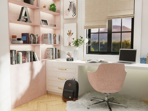 A small pink studio with shelves and a desk