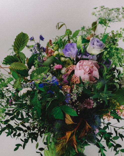 A loose wildflower bouquet with lisianthus and greenery