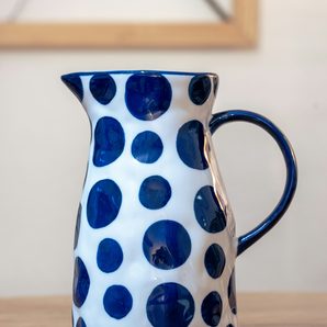 A blue-glazed pouring jug
